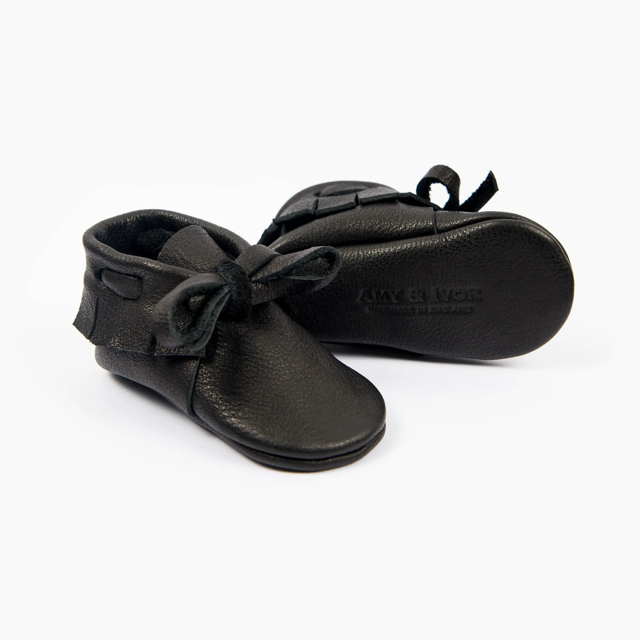 BLACK LACED MOCCASINS