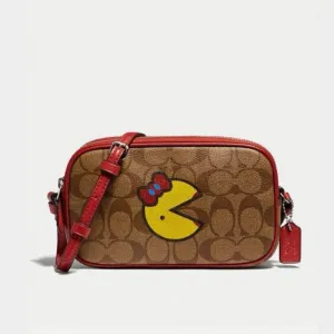 Crossbody Pouch in Signature Canvas with Ms. PacMan