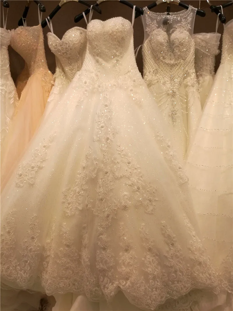 Princess Sweetheart A-line Wedding Dress with Fitted Bodice Beaded Top Lace Train Bridal Gown
