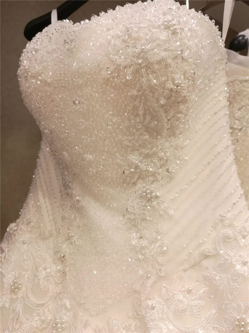 Princess Sweetheart A-line Wedding Dress with Fitted Bodice Beaded Top Lace Train Bridal Gown