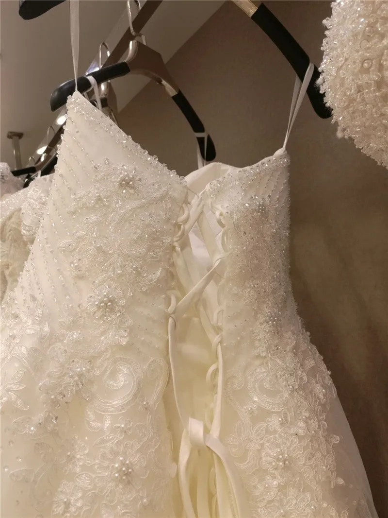 Princess Sweetheart A-line Wedding Dress with Fitted Bodice Beaded Top Lace Train Bridal Gown