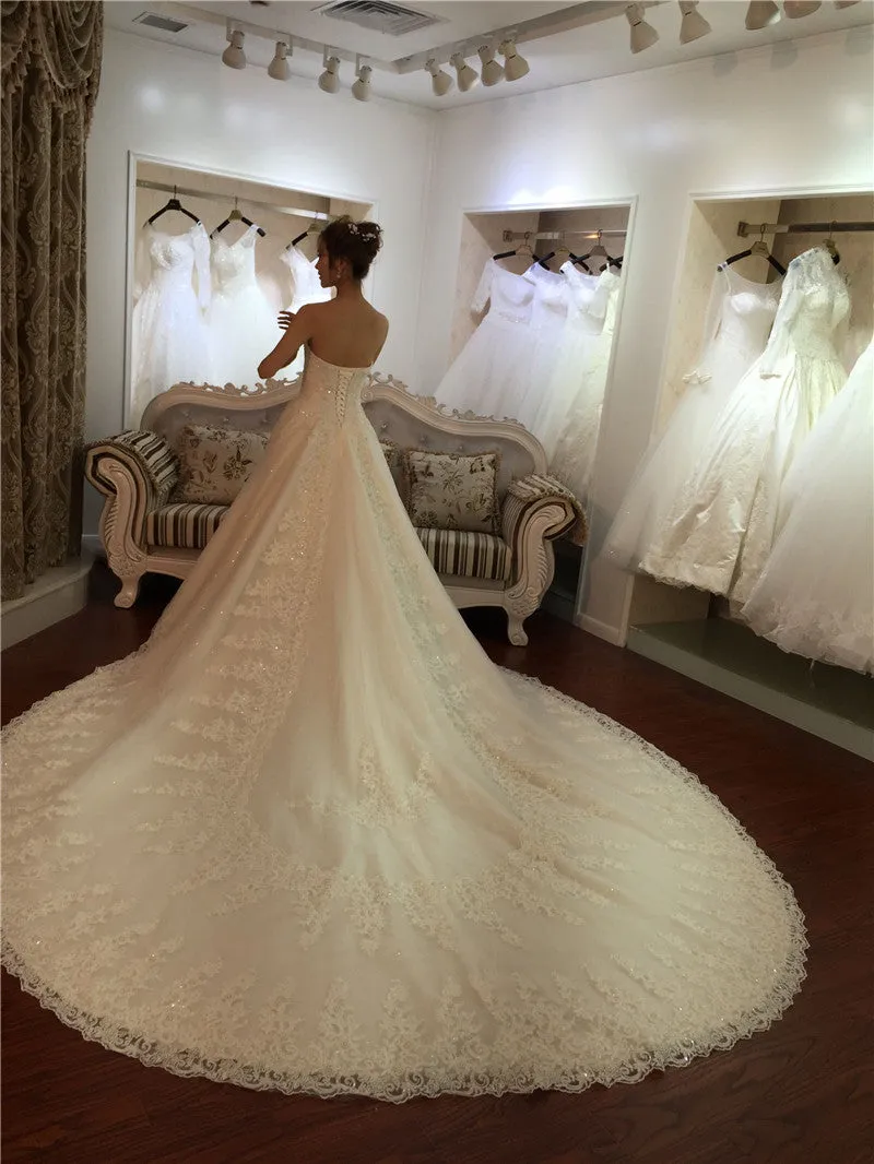 Princess Sweetheart A-line Wedding Dress with Fitted Bodice Beaded Top Lace Train Bridal Gown