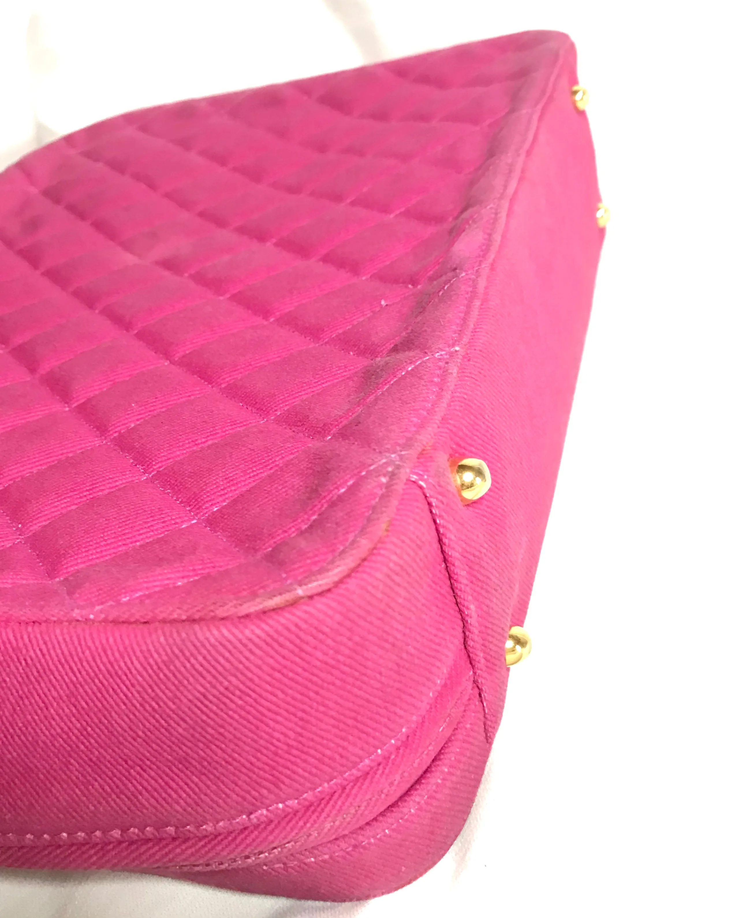 Vintage CHANEL pink canvas business bag style handbag with golden chain handle and a logo charm. Rare and collectible piece.
