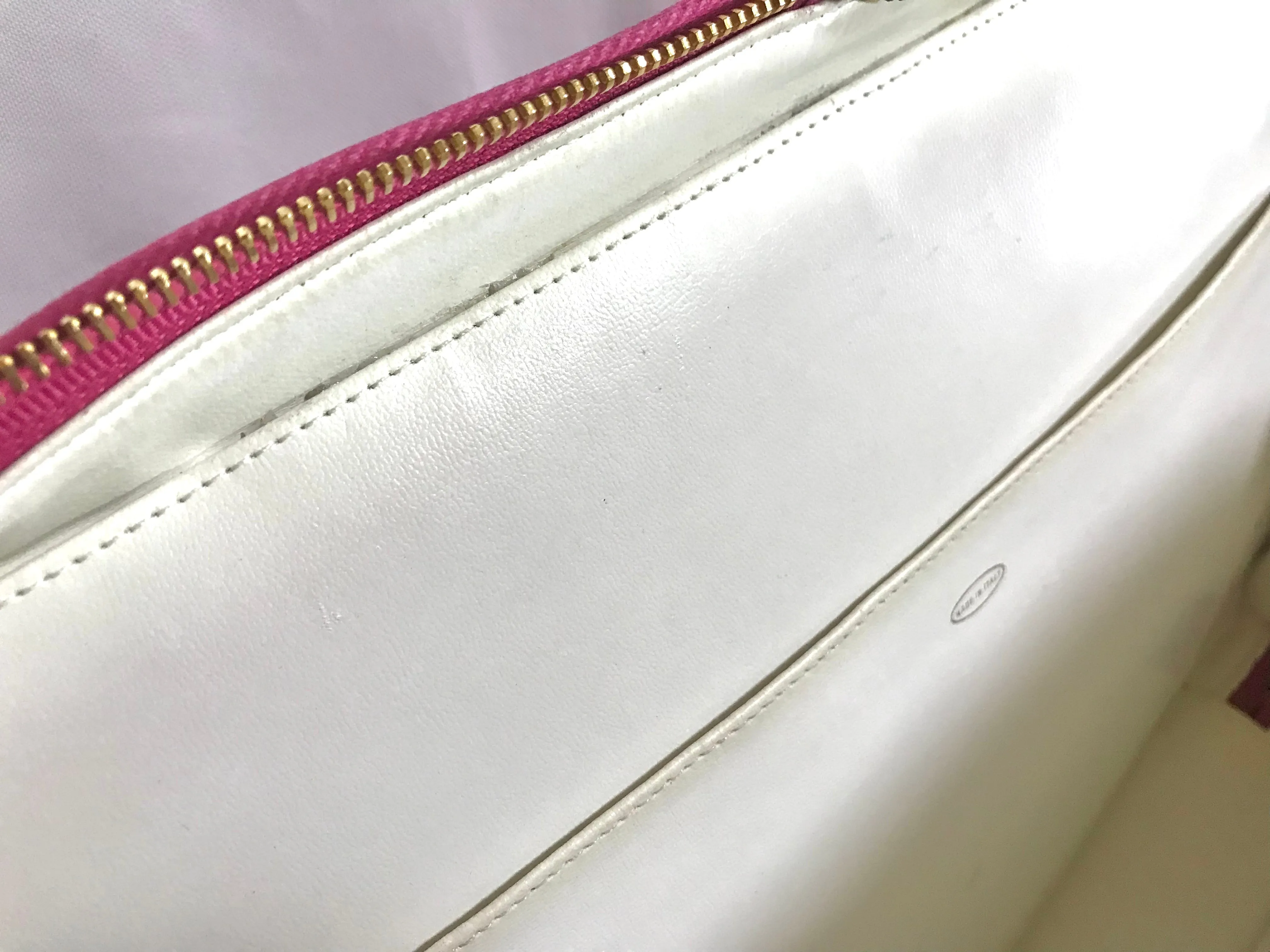 Vintage CHANEL pink canvas business bag style handbag with golden chain handle and a logo charm. Rare and collectible piece.