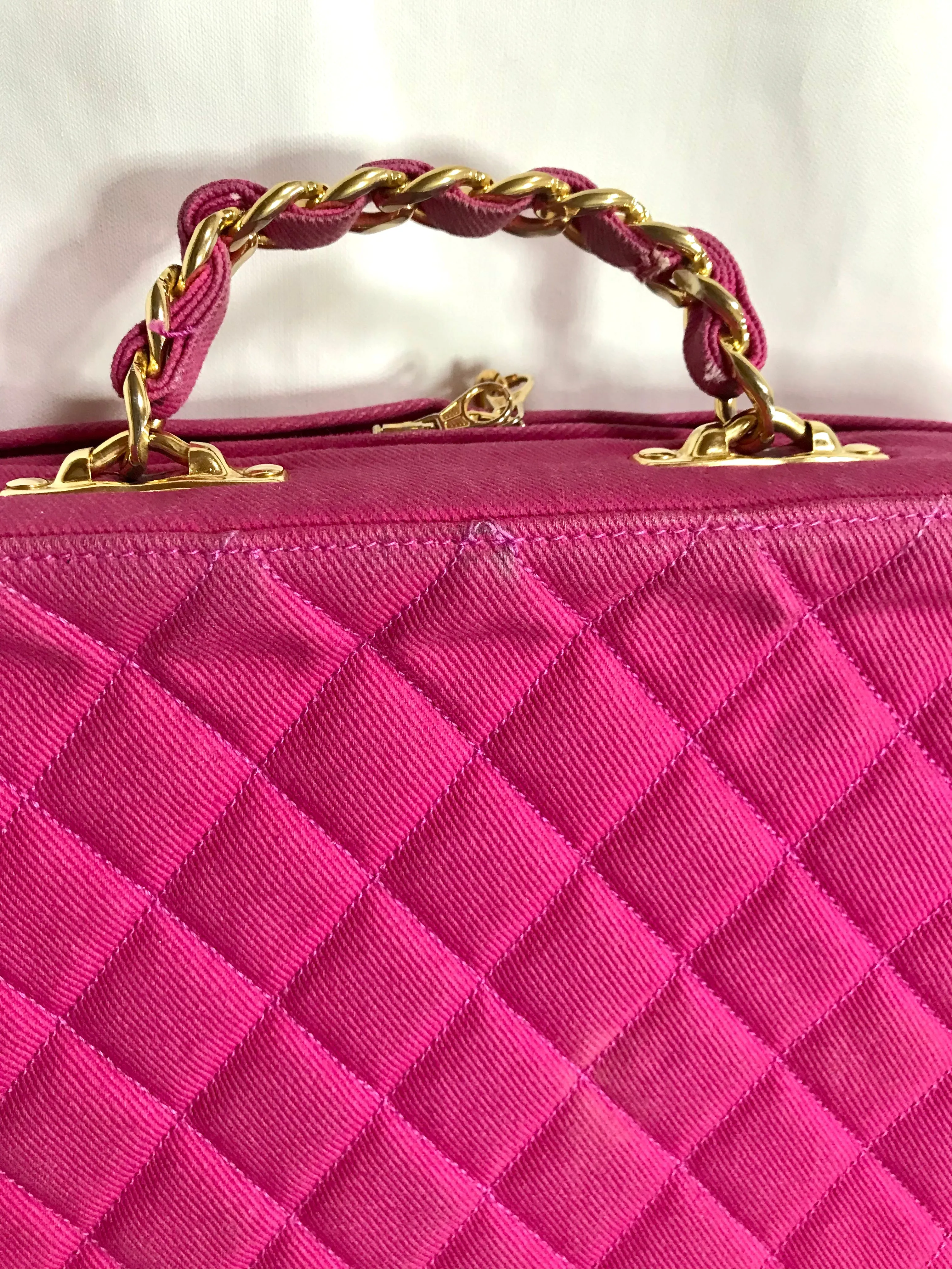 Vintage CHANEL pink canvas business bag style handbag with golden chain handle and a logo charm. Rare and collectible piece.