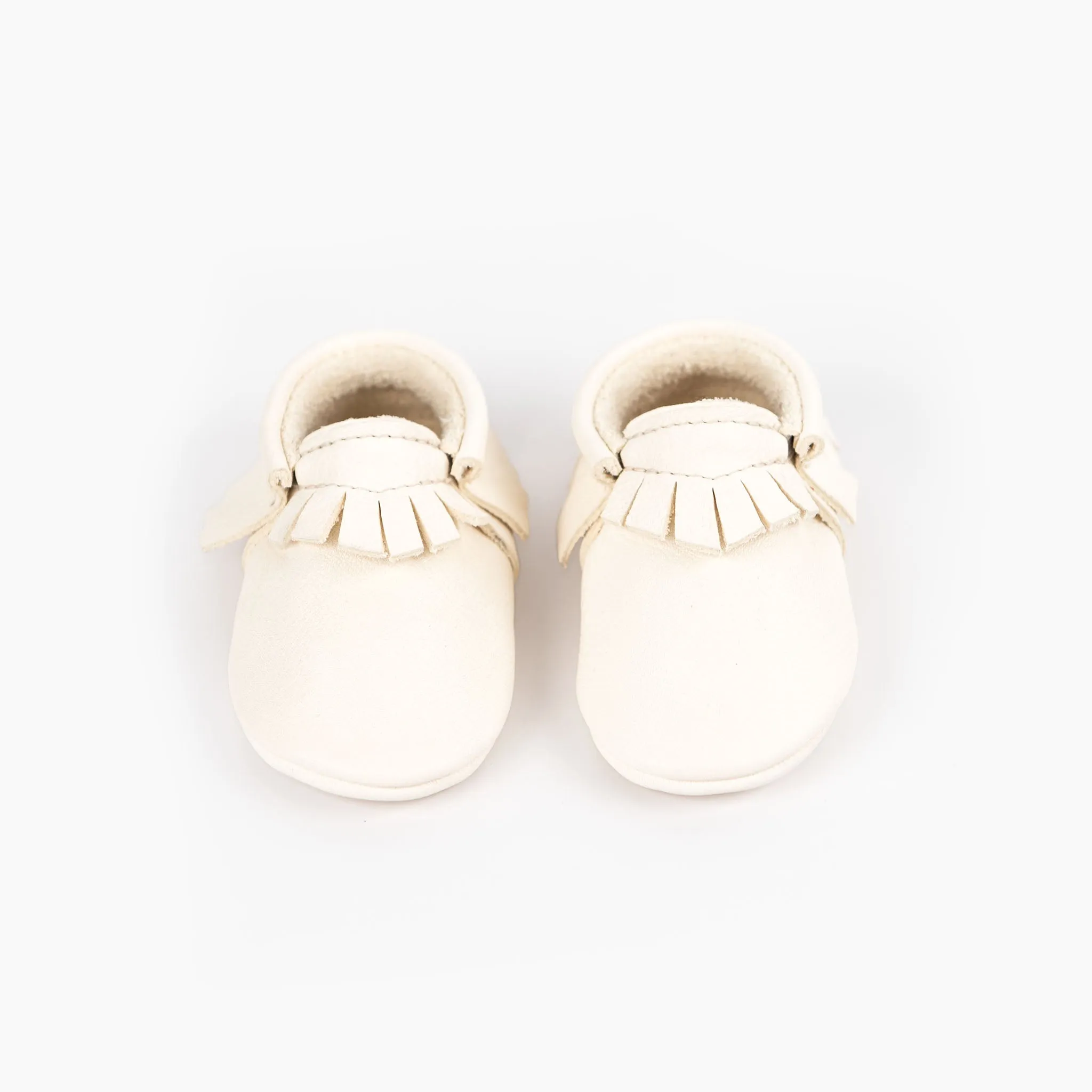 WHITE MOCCASINS