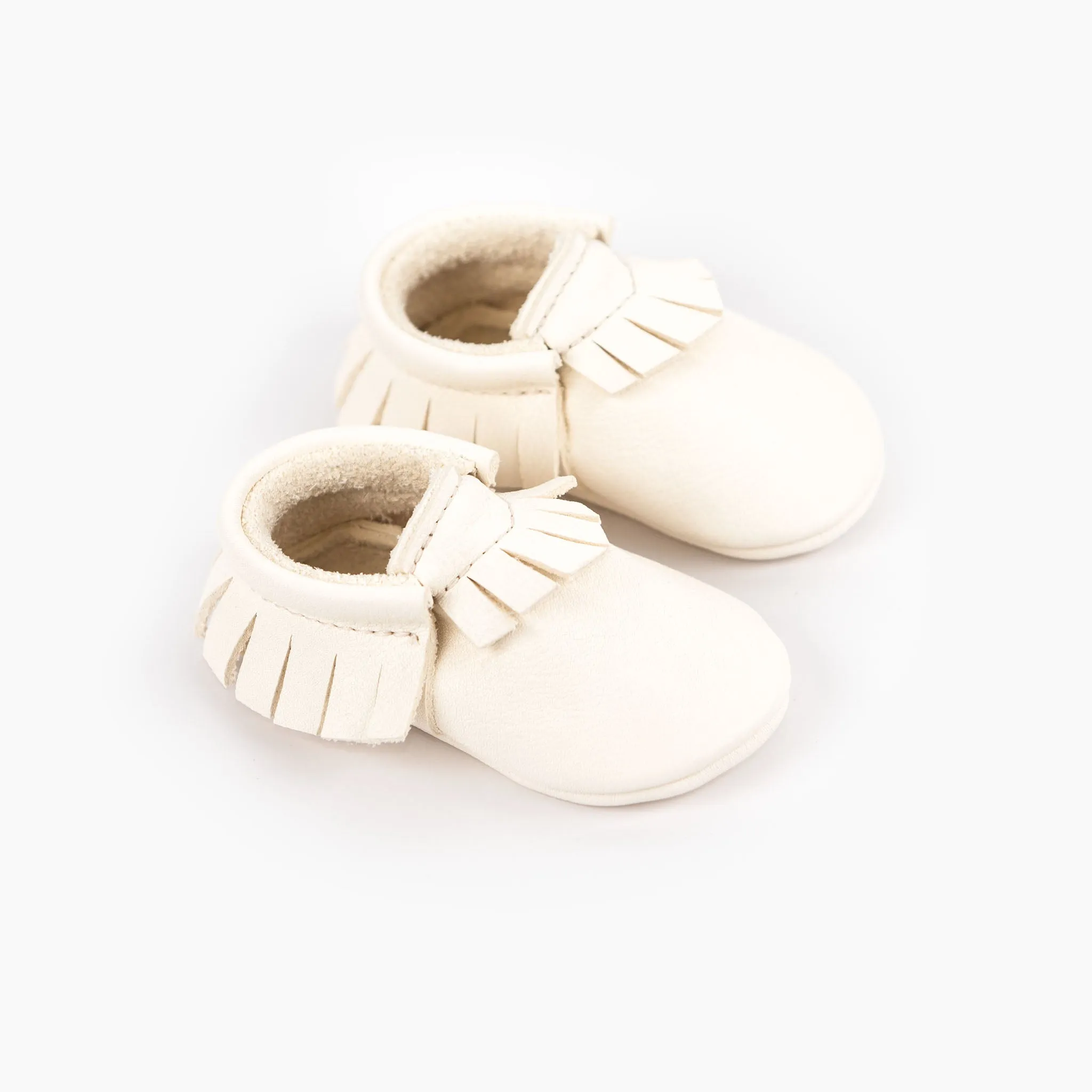 WHITE MOCCASINS