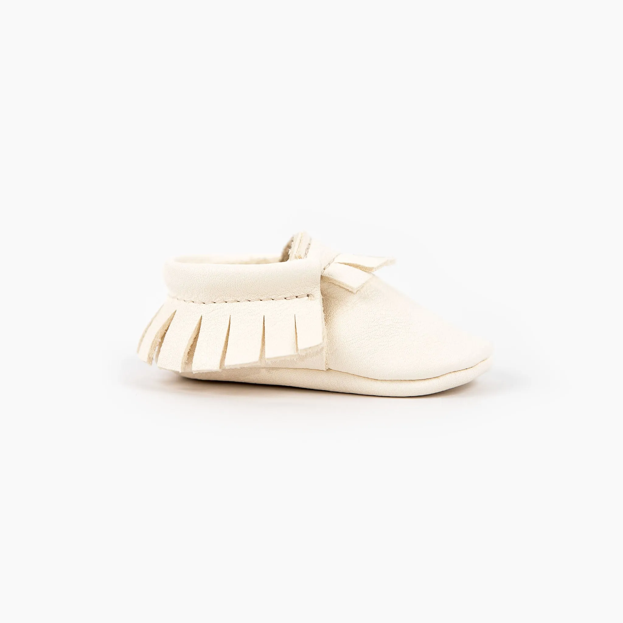 WHITE MOCCASINS